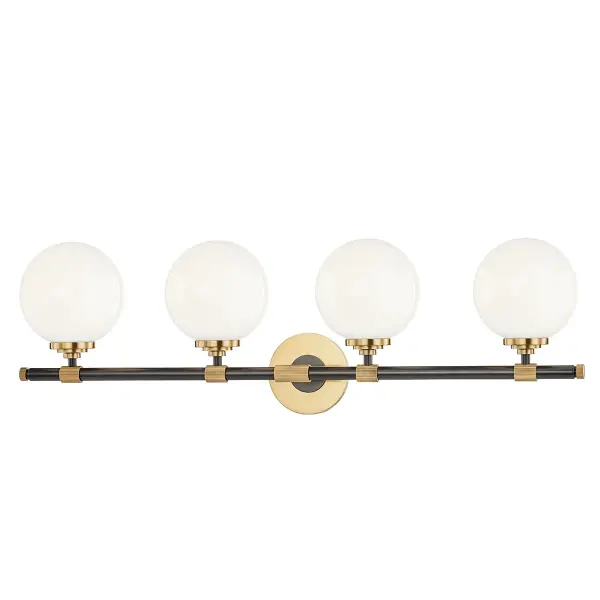 The Bowery bath bracket delivers traditional elegance with its aged old bronze finish and opal glass shades. At 32.75 inches wide, it provides excellent illumination for larger vanities while adding timeless character to bathroom spaces.