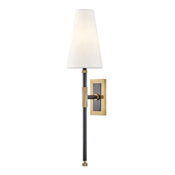 The Bowery wall sconce combines clean lines with an aged bronze finish for versatile style. Its compact 5-inch width and 21.5-inch height make it ideal for hallways, bathrooms, and entryways where space is at a premium.