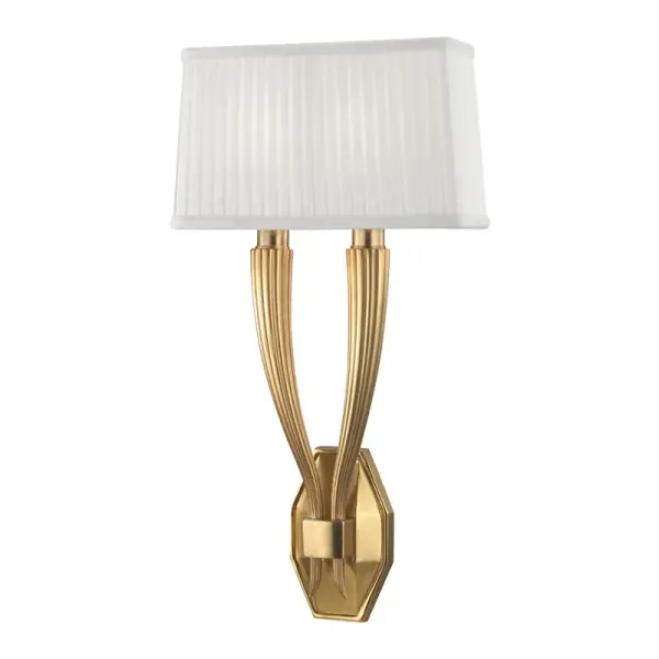 The Erie wall sconce combines textural richness with refined design. Its octagonal backplate, ribbed arms, and pleated silk shades create visual interest while providing soft, diffused light perfect for bedrooms and living spaces.