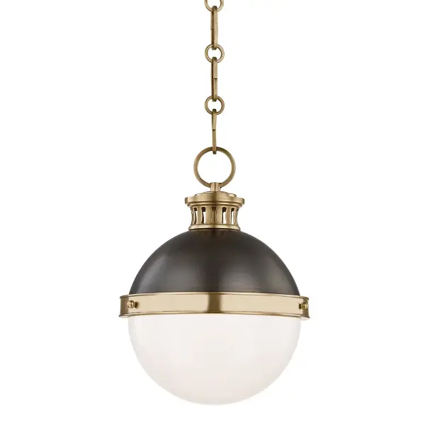 The Latham pendant brings timeless elegance with its aged bronze finish and distinctive ventilated holder design. Spherical mounting pins add refined detail, while the adjustable chain accommodates various ceiling heights.