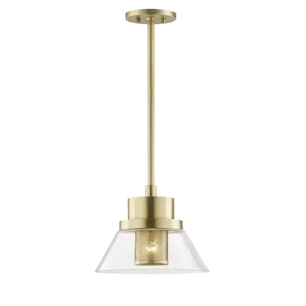 The Paoli pendant reimagines the classic wharf light with minimalist sophistication. Its perforated metal shade creates intriguing light patterns while the aged brass finish adds warmth and character to contemporary spaces.