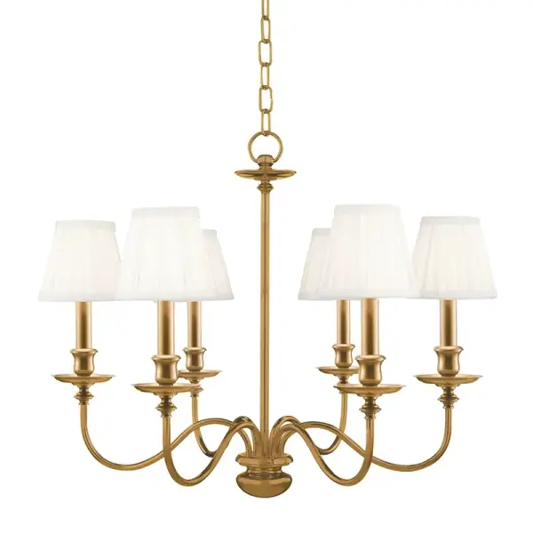 The Menlo Park chandelier combines classic elegance with contemporary sensibility. Its aged brass finish and faux silk shades create warm, inviting illumination perfect for dining spaces and entryways.