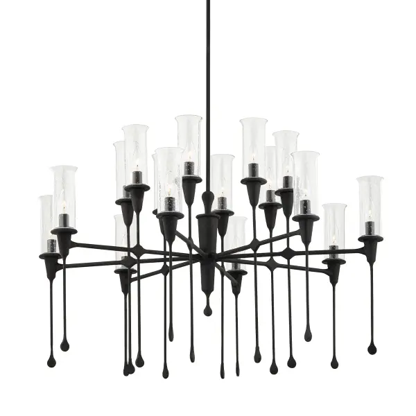 The Chisel chandelier transforms lighting into art with its distinctive cascading design. Hand-crafted with 16 clear seeded glass shades and a dramatic elongated form, it commands attention in any space while providing ample illumination.