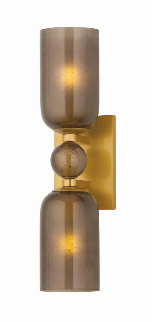 The Hurleyville sconce showcases Indian glass craftsmanship with its distinctive stacked composition of two seeded glass shades and matching orb. The bubbled texture creates graphic appeal while aged brass metalwork adds warmth.