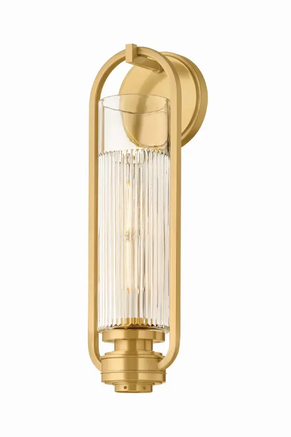 The Binnewater sconce bridges period styling with modern technology. Handsome machined metalwork reveals a layered composition, from the stepped backplate to the subtle coves and banding of the socket cup. A distinctive hook-and-loop suspension adds character to the fixture, which is available in an Aged Brass or Heritage Bronze finish. A fluted shade, reminiscent of Art Deco glass, softly diffuses the light to create a welcoming atmosphere anywhere in the home. Collection: Binnewater Designer: Hudson Valley Lighting Finish: Aged Brass Glass: Clear Optic Width: 4.75" Height: 16.25" Weight: 3.30 lb Extension from Wall: 4.25" Canopy: 4.75"x4.75" Number of Bulbs: 1 Maximum Wattage: 15.00 W Bulb Type: T10-9 Bulb Base: E26 Medium Voltage: 120.00 V Material: Steel Country of Origin: VN Safety Listing: UL/cUL Safety Rating: Damp Manufacturer Warranty: 1 Year Limited Manufacturer Spec Sheet Instructions