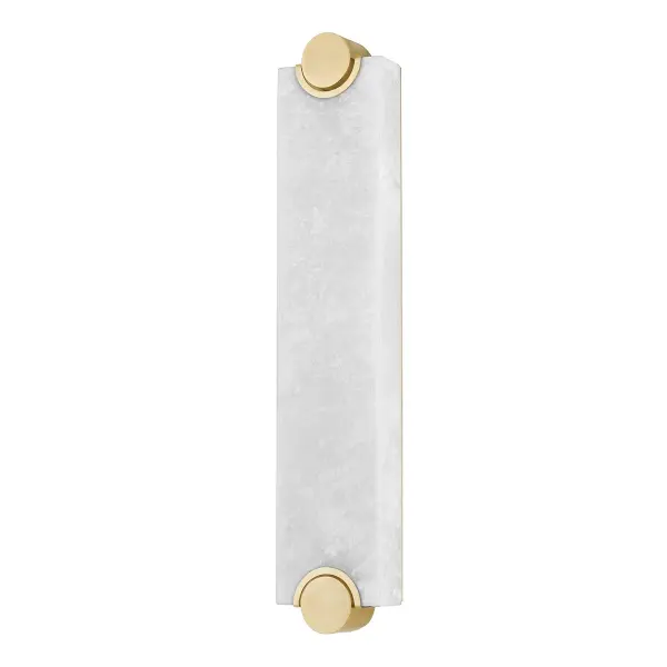 The Brant wall sconce reimagines the classic rectangular form with oversized circular brass details and natural alabaster. Its integrated LED delivers warm, energy-efficient light perfect for modern bathrooms and hallways.