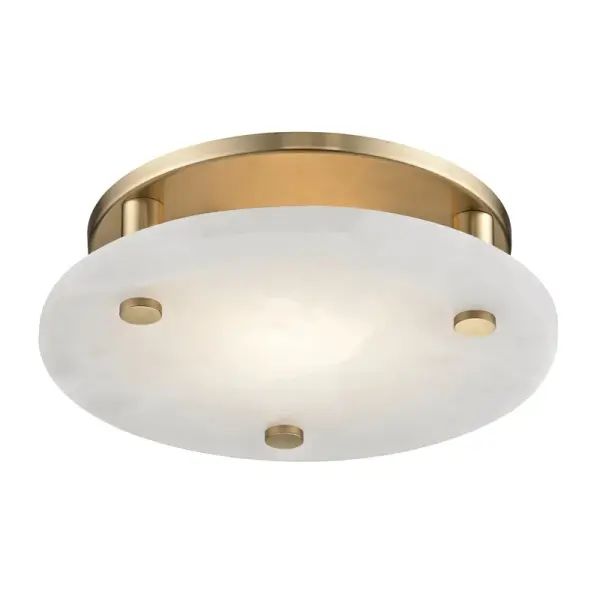 The Croton flush mount delivers sophisticated ambient lighting in a compact 12.25-inch profile. Its aged brass finish and alabaster glass create warm, diffused illumination ideal for spaces with lower ceilings or intimate settings.