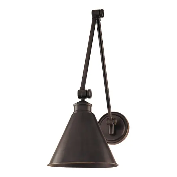 The Exeter wall sconce combines form and function with its three-axis adjustability, allowing you to direct light precisely where needed. Its industrial aesthetic and quality bronze finish make it equally suited for task lighting or decorative accent.