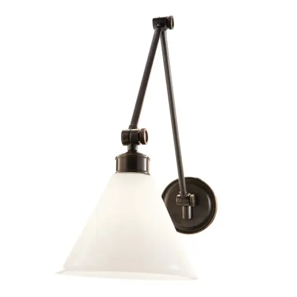 The Exeter wall sconce offers exceptional flexibility with three-axis adjustment, allowing you to direct light exactly where needed. Its industrial aesthetic pairs beautifully with both traditional and modern interiors.