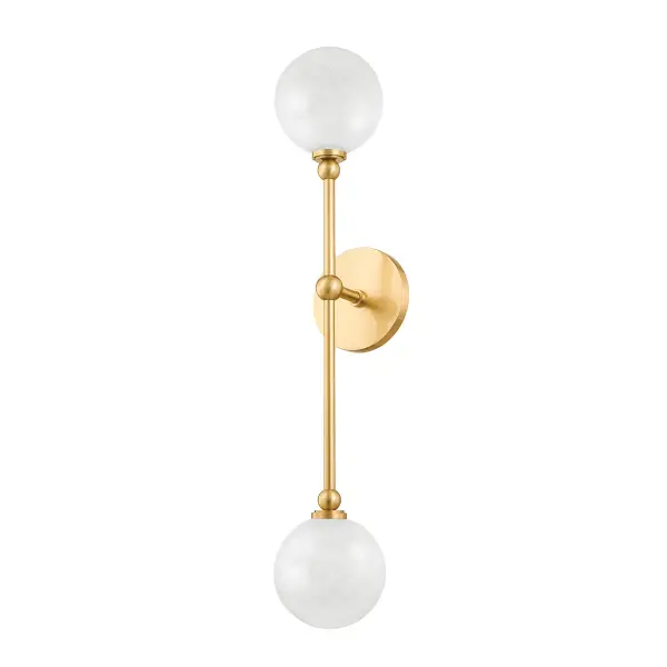 The Andrews sconce combines streamlined modern design with warm ambiance. Cloud-etched glass globes create a soft, diffused glow atop slender brass arms with decorative metal orbs. Ideal for bathrooms and hallways where style meets function.