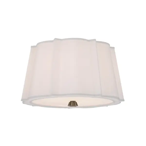The Humphrey flush mount combines soft white fabric with aged brass metalwork to create a sophisticated ceiling fixture. Its intricate pleated shade design adds visual interest while providing gentle ambient lighting for low-ceiling spaces.