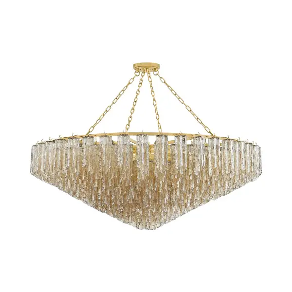 Watertown is a maximalist showstopper featuring 33 organically shaped Tronchi glass shades with textured cuts arranged in a descending cascade. The Aged Brass finish and Art Deco-inspired design create a dramatic focal point perfect for grand spaces.