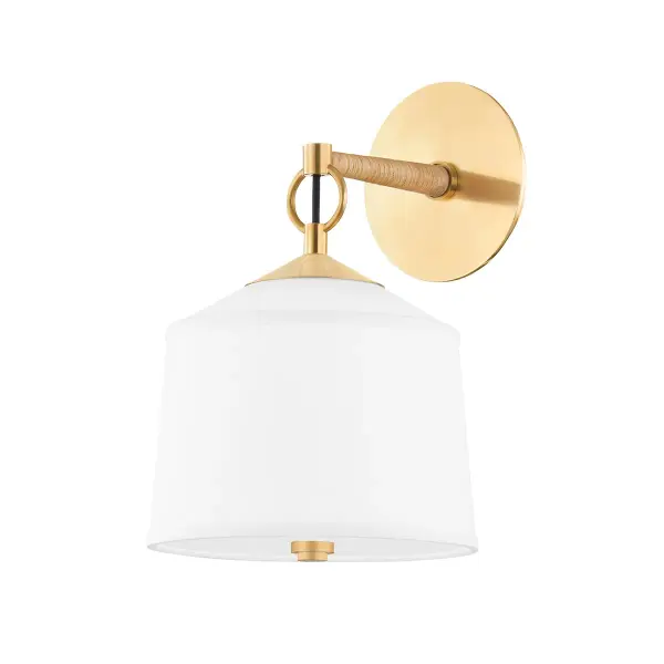 White Plains delivers sophisticated warmth through its blend of solid brass, natural rattan wrapping, and crisp white linen. The classic silhouette works beautifully in both traditional and contemporary settings, offering versatile style.