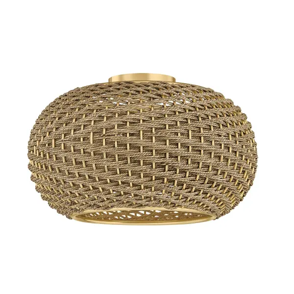 The Penarth flush mount brings organic warmth with its hand-woven seagrass shade in a distinctive diagonal spiral pattern. The Aged Brass trim adds refined polish while the natural material creates beautiful ambient light diffusion.