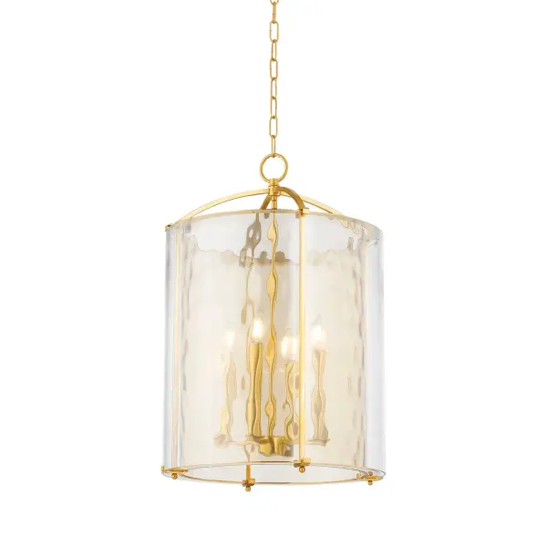 The Ramsey lantern pendant combines artisanal water glass with aged brass framework for a sophisticated transitional look. Its generous 18-inch width and adjustable height make it versatile for various ceiling heights and room sizes.