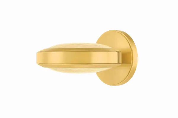 The Harris sconce delivers focused task lighting in a petite, refined package. Its swiveling arm and integrated LED make it ideal for reading nooks and vanities, while the textured Sprite glass adds visual interest to the minimalist brass frame.