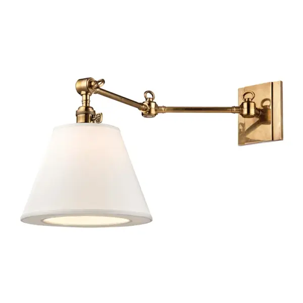The Hillsdale sconce brilliantly merges vintage industrial functionality with modern sophistication. Its cast swivel mechanism offers exceptional adjustability for reading or task lighting, while the custom linen shade softens the look and provides ambient illumination.