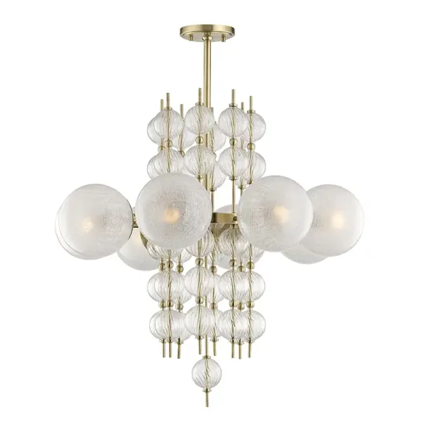 Calypso delivers dramatic visual impact with its whimsical combination of fluted-spiral glass orbs and crackle-glass spheres. The aged brass finish adds warmth while the sculptural geometry creates a wow-factor focal point.