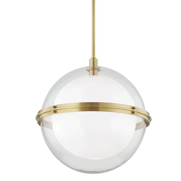 The Northport pendant combines a substantial 22-inch glass globe with warm aged brass detailing for a sophisticated focal point. Its generous scale and adjustable height make it versatile for various ceiling heights and room sizes.