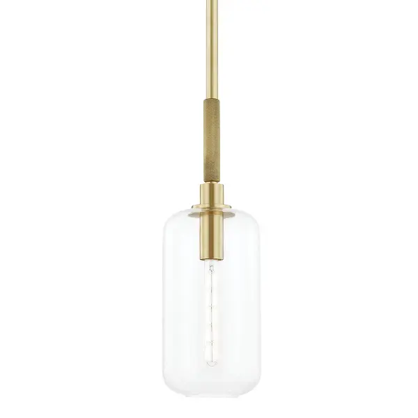 The Lenox Hill pendant combines classic aged brass with clear glass for a refined look that works in both traditional and contemporary spaces. Its compact 8.25" diameter makes it ideal for smaller areas or grouped installations.