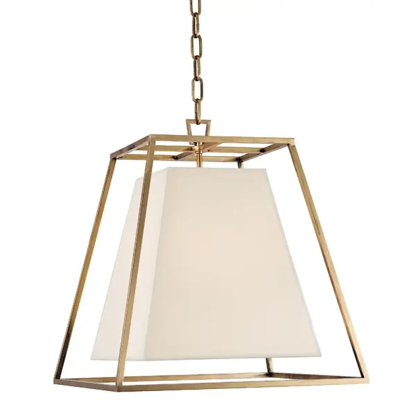 Kyle balances clean geometric lines with the warmth of aged brass, creating a sophisticated focal point. The open frame design showcases dimensional contrast while the faux silk shades soften the light beautifully.