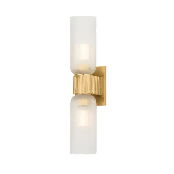 The Irondale wall sconce combines minimalist hourglass design with exquisite detailing. Vertical knurling on the stem transitions seamlessly into hand-cut clear glass, creating visual interest while providing both uplight and downlight functionality.