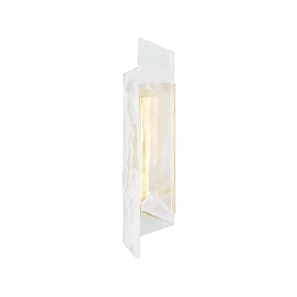 The Greenville sconce showcases artisanal craftsmanship with its single piece of folded piastre glass featuring a distinctive white swirl pattern. The reversible shade design offers installation flexibility, while integrated LED provides efficient, warm illumination.
