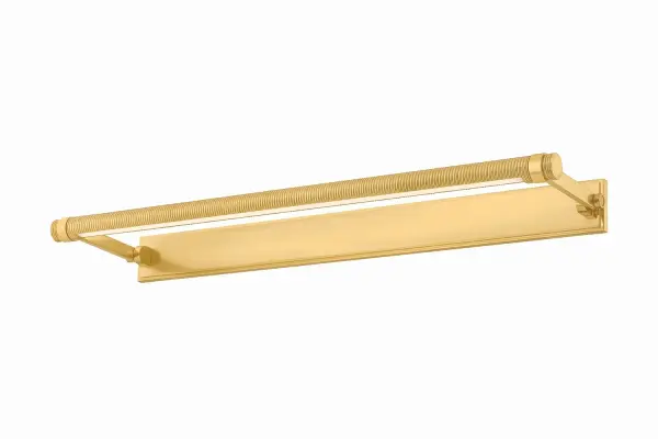 The Duell picture light brings industrial sophistication to artwork illumination with its knurled cylindrical shade and oversized architectural brackets. The integrated LED provides museum-quality lighting while the aged brass finish adds warmth.