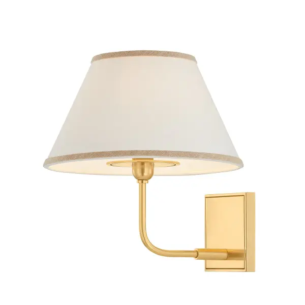 The Durland sconce brings transitional charm with its overscale white linen shade and aged brass frame. Thoughtful details like ivory trim and rounded angles create a soft, sophisticated look that works in both traditional and coastal settings.