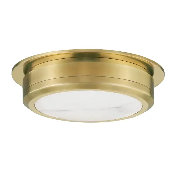 The Greenport combines premium Spanish alabaster with a sleek metal frame for a sophisticated flush mount that delivers both ambient and side illumination. Its convex shade beautifully refracts light while the natural stone veining adds organic character.