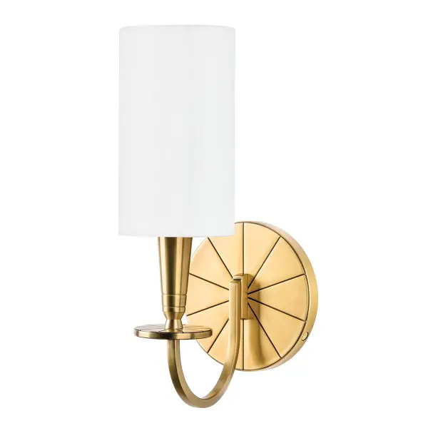 The Mason wall sconce blends classical elegance with modern edge through its distinctive engraved wheel motif. Hard bevel-cut arms and refined proportions create a sophisticated fixture that bridges traditional and contemporary aesthetics.