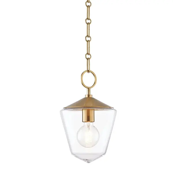 The Greene pendant combines classic globe styling with warm aged brass finish for versatile appeal. Its compact 8.25" diameter makes it ideal for smaller spaces or grouped installations over islands and bars.