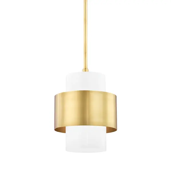 The Corinth pendant combines a sleek glossy cylinder diffuser with an offset aged brass band for refined visual interest. Its minimalist design and textural contrast make it versatile enough for solo installation or grouped arrangements.