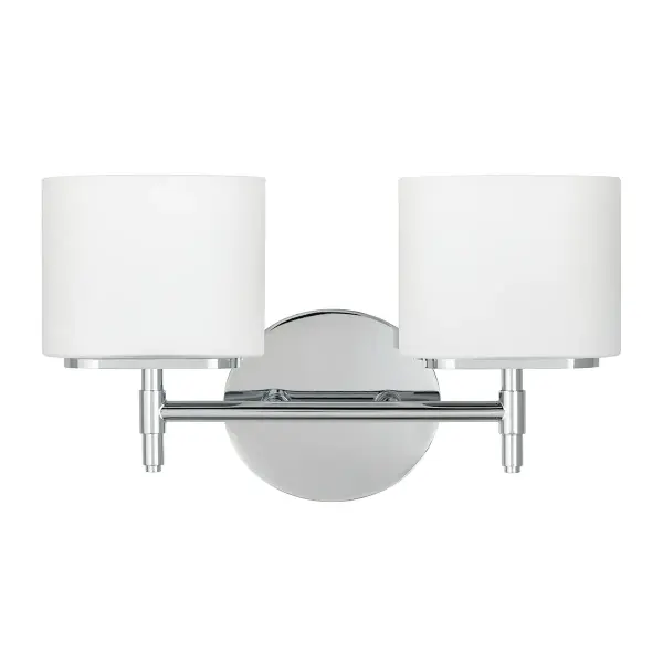 The Trinity bath bracket combines hand-cut crystal prisms with modern LED technology. Its angular, triangular form creates dramatic light patterns while the polished chrome finish adds contemporary elegance to bathroom spaces.