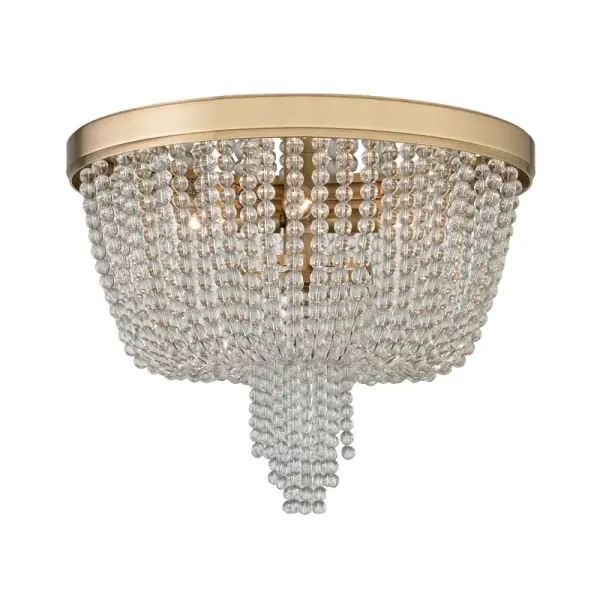 The Royalton flush mount delivers timeless sophistication with its aged brass finish and clear glass shades. Perfect for spaces with lower ceilings, this fixture provides ample illumination while maintaining a refined aesthetic.