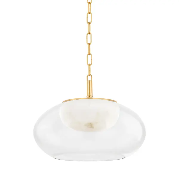 Moore delivers sophisticated simplicity through its innovative nested glass design. The clear outer shade reveals a luminous alabaster inner layer, creating dimensional depth and warm, diffused light. Aged brass metalwork adds timeless luxury.