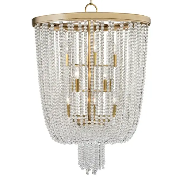 The Royalton delivers commanding presence with its 26-inch width and 12 candelabra lights. The aged brass finish brings warmth and sophistication, while clear glass shades provide brilliant illumination. A substantial fixture designed for spaces that demand impact.