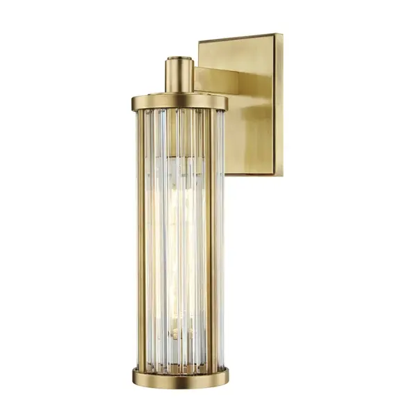 The Marley wall sconce combines classic brass warmth with clean contemporary lines. Its compact 4.5-inch width makes it ideal for tight spaces like bathrooms and hallways, while the aged brass finish adds sophisticated character.