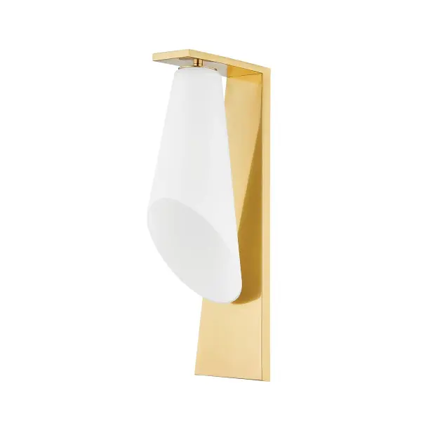 The Andros sconce combines sharp architectural lines with a sophisticated conical silhouette. Its bias-cut opal glass shade creates distinctive elliptical light projection, while the L-shaped backplate adds visual interest.