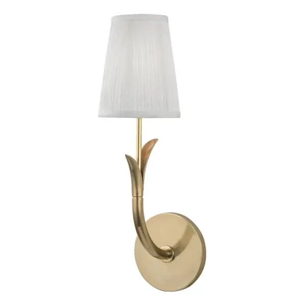 The Deering wall sconce combines classic proportions with contemporary simplicity. Its aged brass finish and compact profile make it ideal for bathrooms, hallways, and intimate spaces requiring refined task or ambient lighting.