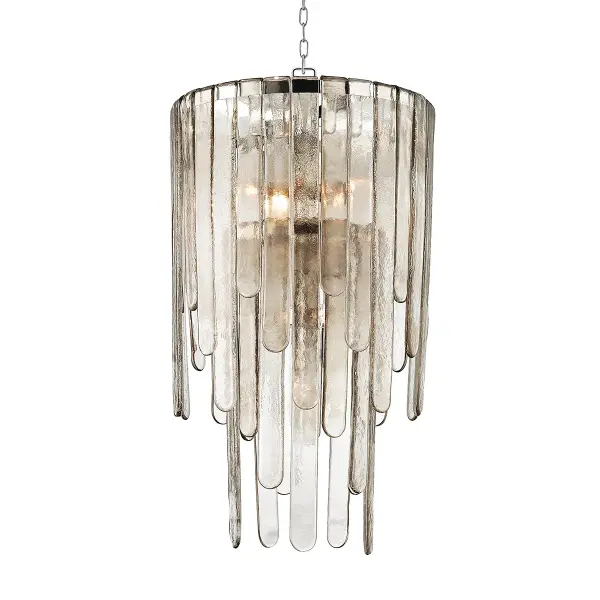 The Fenwater chandelier combines transitional elegance with contemporary clean lines. Its polished nickel finish and 9-light configuration provide substantial illumination while maintaining refined sophistication.