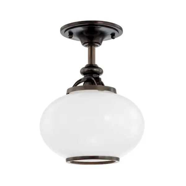 The Canton semi-flush mount delivers classic styling in a compact 9-inch profile, perfect for smaller spaces with lower ceilings. The Old Bronze finish and opal glass shade create warm, diffused lighting ideal for intimate areas.