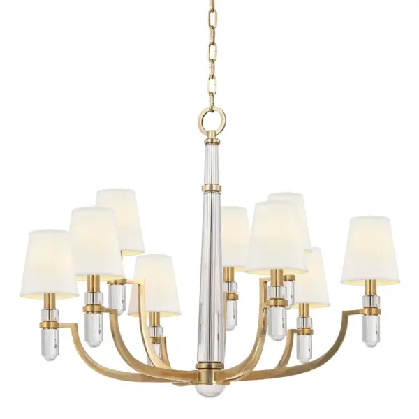 This substantial nine-light chandelier from Hudson Valley Lighting delivers dramatic presence with its aged brass finish and multi-light configuration. Perfect for grand dining rooms and foyers requiring significant illumination and visual impact.