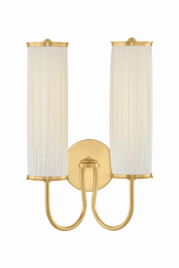 Elaine delivers refined sophistication through its gathered silk shade and swooping Aged Brass metalwork. Perfect for transitional spaces, it provides soft, diffused light with sculptural elegance. Ideal for hallways, bedrooms, and powder rooms.