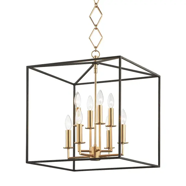 This substantial lantern pendant combines aged brass and black finishes for a sophisticated two-tone look. Eight lights provide ample illumination for foyers and dining rooms, while clear glass panels showcase the bulbs as part of the design.
