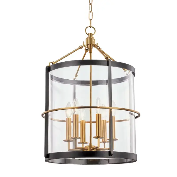 The Ren lantern brings traditional elegance with its six-light configuration and aged old bronze finish. Clear glass panels showcase the candelabra bulbs while the substantial 17.5" width makes a statement in foyers and dining spaces.