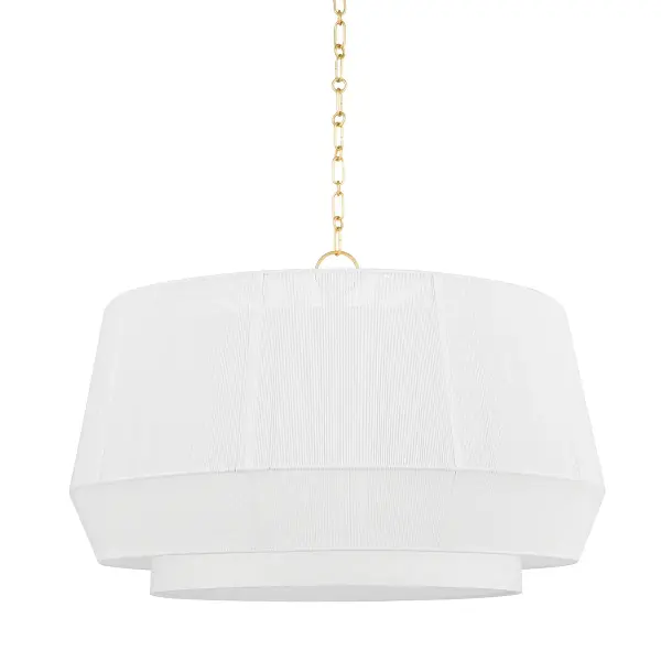 Debi creates visual intrigue through its multi-dimensional construction, pairing a clean white linen drum shade with a delicate linen-wrapped metal frame. The aged brass accents add warmth and glamour to the monochromatic palette, making it versatile enough for both traditional and contemporary spaces.