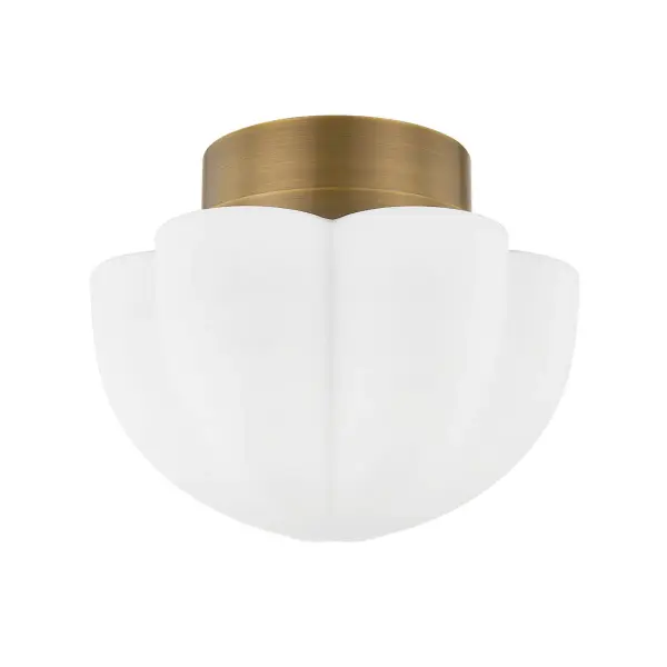 Seabrook elevates standard flush mount lighting with its gently scalloped botanical shade and warm Heritage Bronze finish. The Opal Matte glass diffuses light beautifully, making it ideal for transitional spaces like hallways and vestibules.