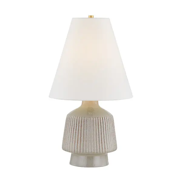 This distinctive table lamp features a handcrafted ceramic cocoon shade paired with aged brass accents, creating a sophisticated organic modern aesthetic. The textured ceramic diffuses light beautifully while serving as a sculptural statement piece.