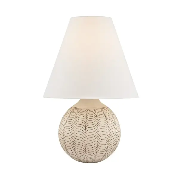 This sophisticated table lamp combines artisanal ceramic craftsmanship with warm aged brass detailing. The ivory petal-textured ceramic base creates visual interest while maintaining versatility across design styles.